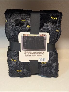 Northwest Black Embroidered Faux Fur Throw with Yellow Cat Eyes